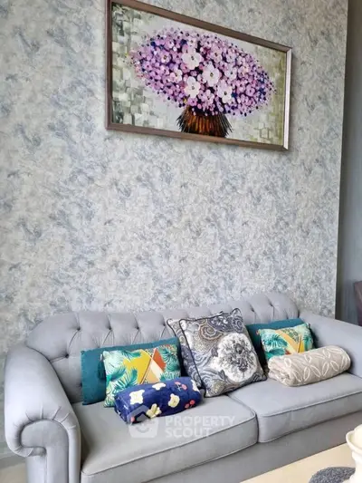 Elegant living room with stylish sofa and floral artwork
