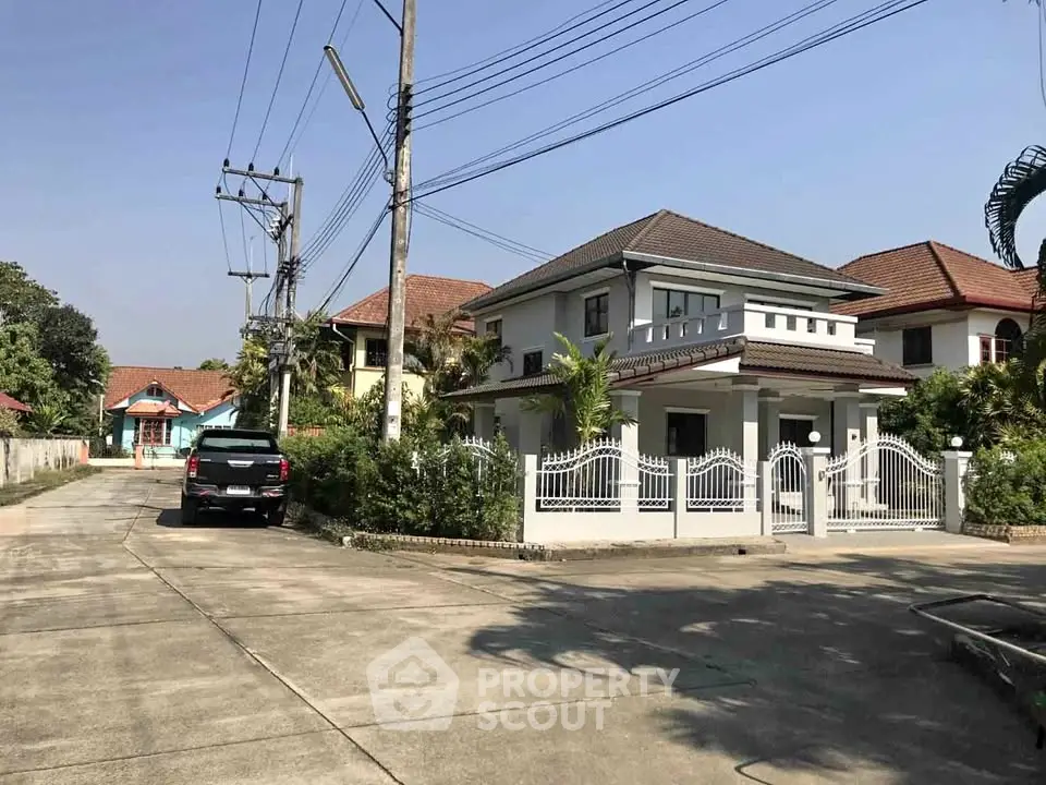 Charming suburban house with gated entrance and spacious driveway