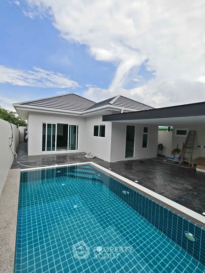 Modern home exterior with private pool and sleek design