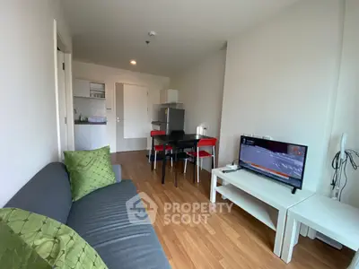 Modern living room with sleek furniture and open layout, perfect for urban living.