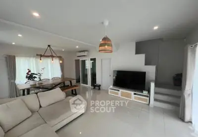 Spacious modern living room with open layout and stylish decor