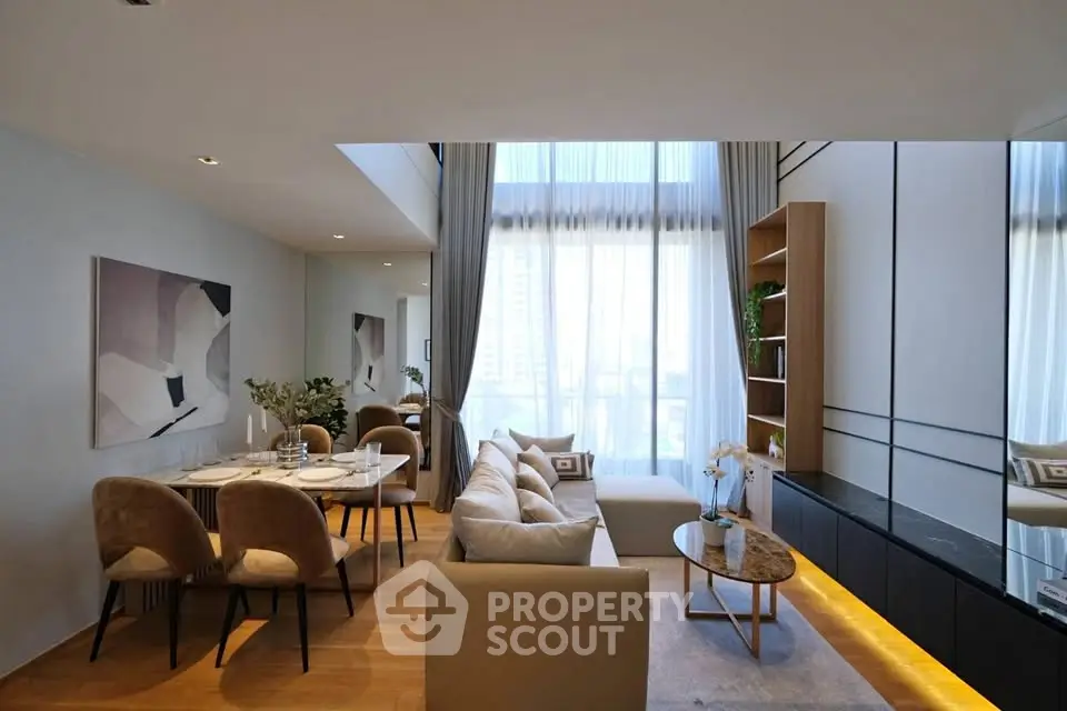 Luxurious modern living room with elegant dining area and floor-to-ceiling windows