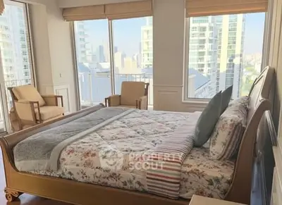 Luxurious bedroom with stunning city view and elegant decor