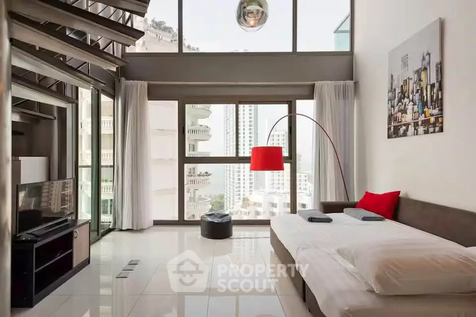 Luxurious modern living room with stunning city view and stylish decor