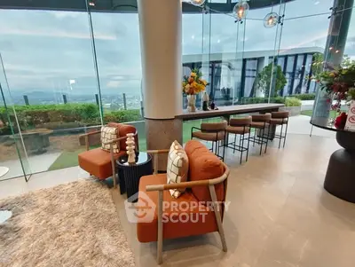 Luxurious living room with panoramic glass walls and modern decor