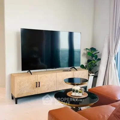 Modern living room with sleek TV setup and stylish decor