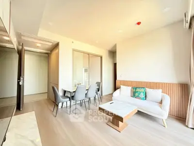 Modern living room with elegant dining area and stylish furniture