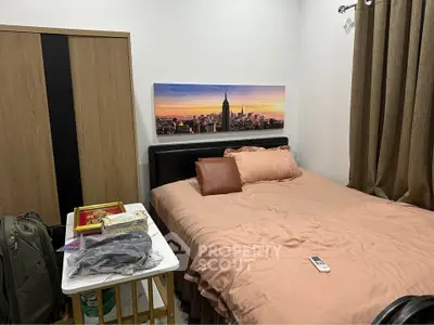 Cozy bedroom with stylish decor and ample storage space