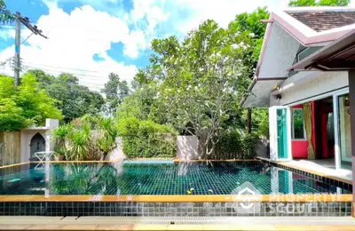 Stunning villa with private pool and lush garden, perfect for luxury living.