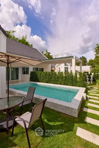 Charming modern home with private pool and lush garden, perfect for relaxation and entertaining.