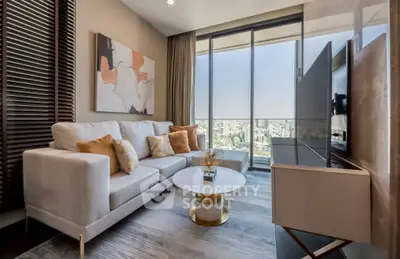 Luxurious living room with modern decor and stunning city view from large windows.