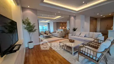 Luxurious modern living room with elegant decor and spacious seating area, perfect for relaxation and entertainment.