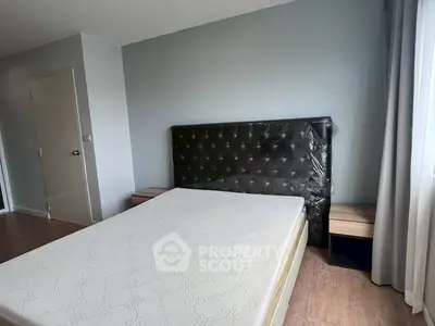 Modern bedroom with stylish headboard and natural light