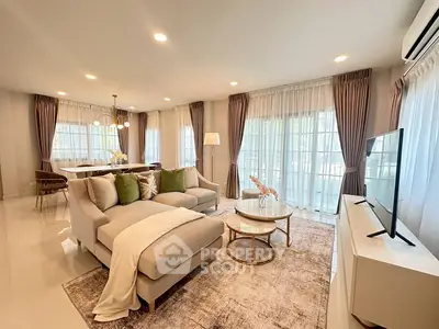 Spacious modern living room with elegant decor and natural light