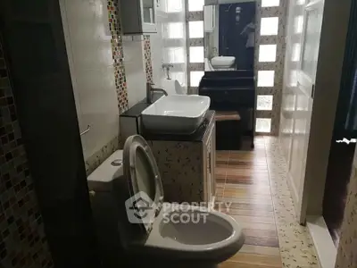 Modern bathroom with stylish tiles and contemporary fixtures