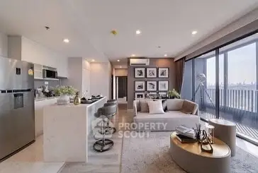Modern open-plan living room with kitchen and balcony view