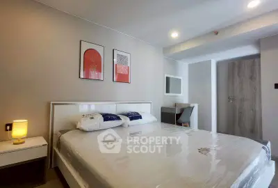 Modern bedroom with stylish decor and cozy ambiance