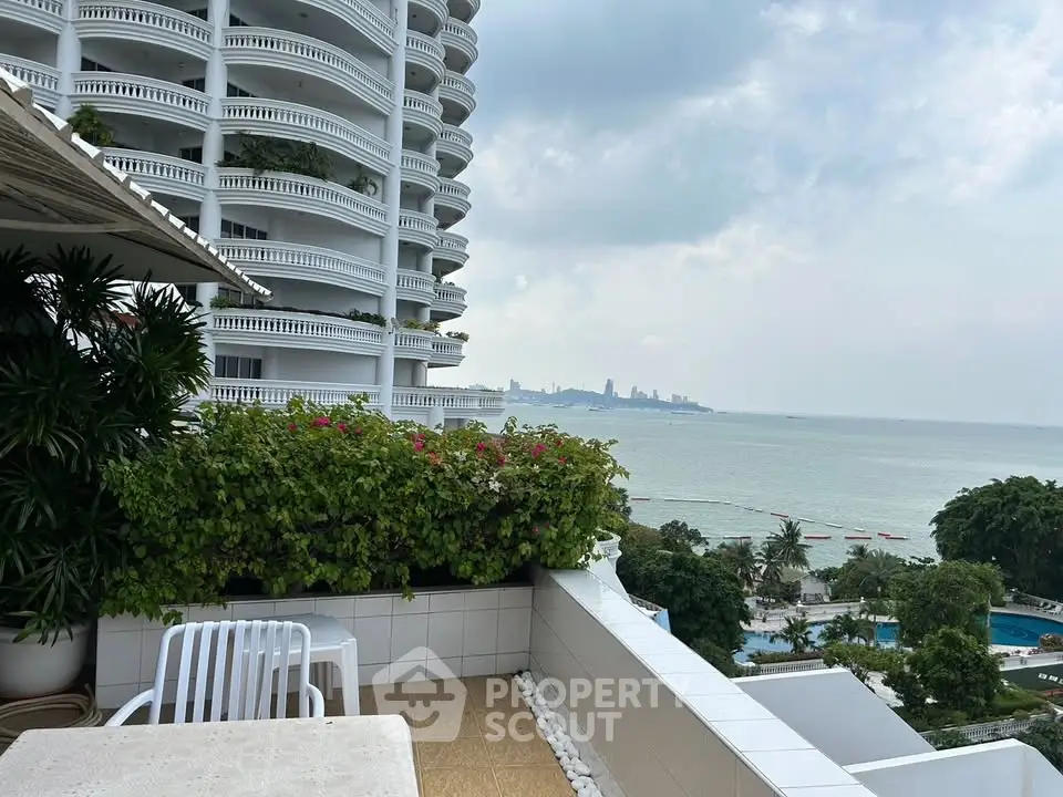 Stunning ocean view from a spacious balcony in a modern high-rise building