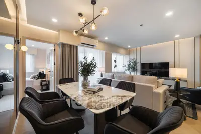 Luxurious modern living room with elegant dining area and stylish decor