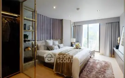 Luxurious bedroom with modern decor and large windows offering natural light and scenic views.
