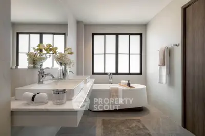 Luxurious modern bathroom with elegant bathtub and stylish decor