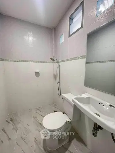 Modern bathroom with sleek fixtures and elegant tile design