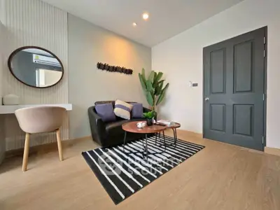 Stylish living room with modern decor and cozy seating area
