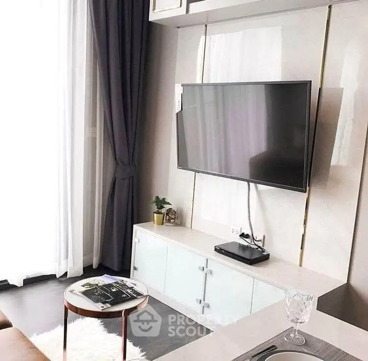 Modern living room with wall-mounted TV and elegant decor