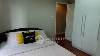 Cozy bedroom with stylish decor and ample storage space