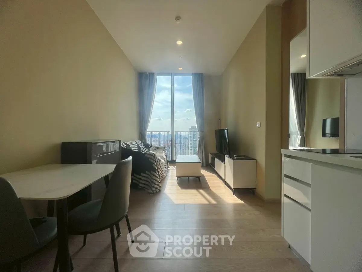 Modern living room with city view, featuring sleek furniture and open layout, perfect for urban living.