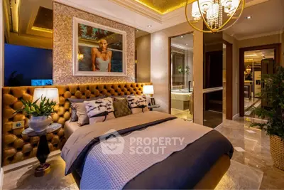 Luxurious bedroom with elegant decor and ambient lighting, featuring plush bedding and stylish artwork.