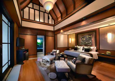 Luxurious bedroom with high ceilings and elegant decor in a modern home