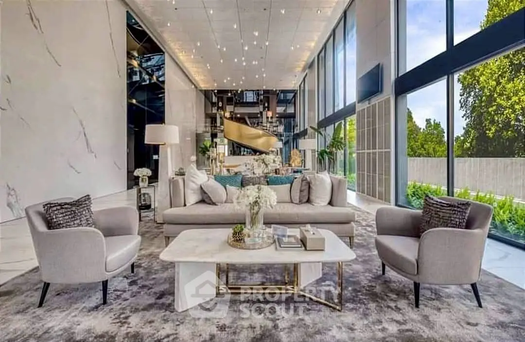 Luxurious modern living room with high ceilings and large windows offering stunning views.