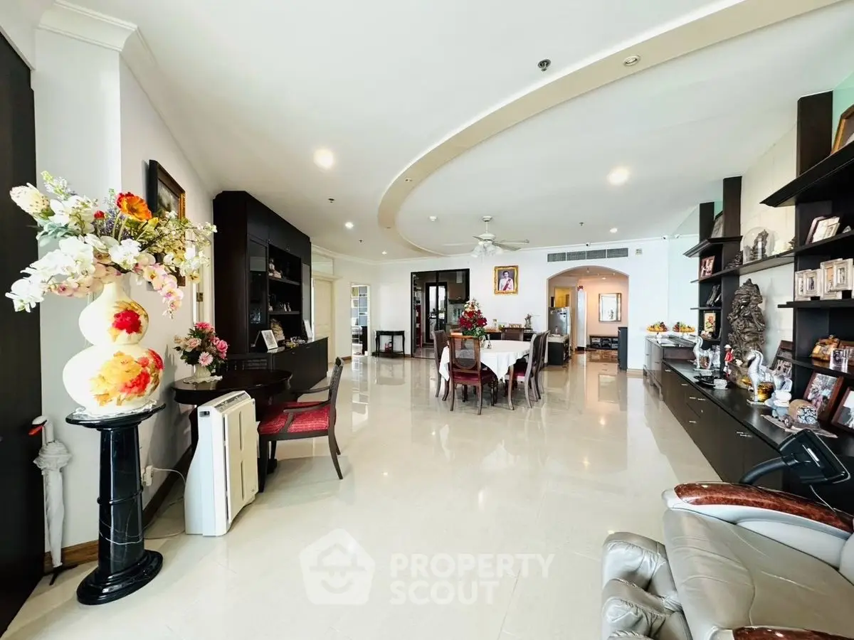Spacious living room with elegant decor and open layout, perfect for entertaining guests.