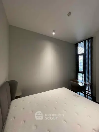 Modern bedroom with minimalist design and natural light