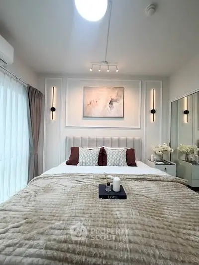 Luxurious bedroom with elegant decor and plush bedding in modern apartment