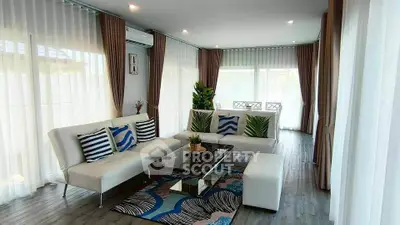 Spacious modern living room with elegant decor and natural light