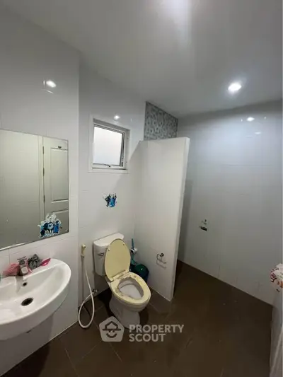 Modern bathroom with sleek fixtures and a clean, minimalist design.