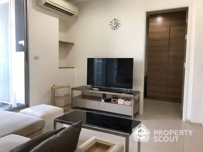 Fully Furnished 2 Bedrooms Condo at Rhythm Sukhumvit 50 Livingroom