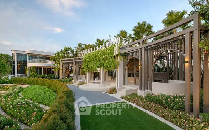 Luxurious garden entrance with modern architecture and lush landscaping