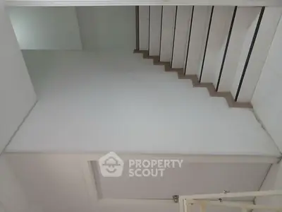 Modern staircase with sleek design and minimalist aesthetic in a contemporary home.