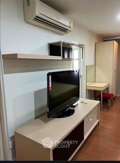 Modern living room with air conditioning and sleek furniture design