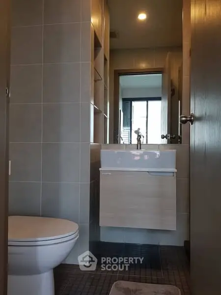 Modern bathroom with sleek fixtures and natural lighting