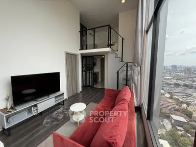 Stunning loft apartment with floor-to-ceiling windows and city view