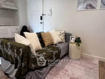 Cozy living room with stylish sofa and chic decor