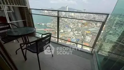 Stunning high-rise balcony with panoramic city and ocean views