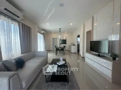 Spacious modern living room with elegant decor and natural light