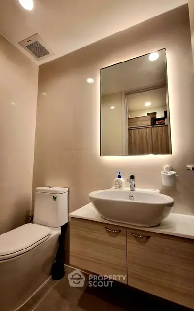 Modern bathroom with sleek fixtures and ambient lighting