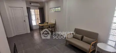 Modern living room with minimalist decor and natural light