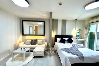 Modern studio apartment with stylish decor and cozy ambiance